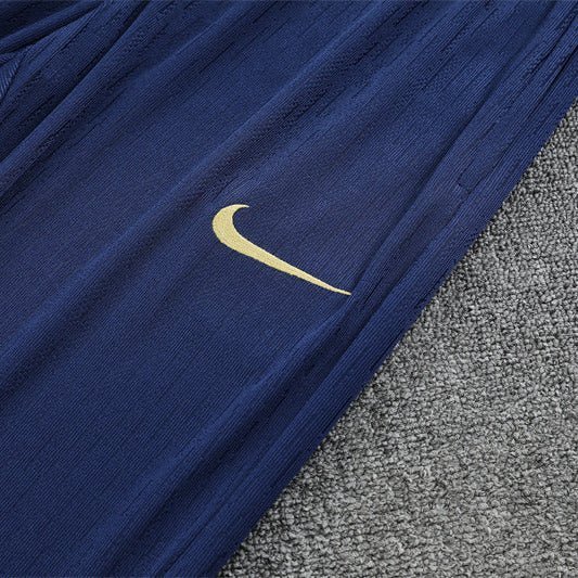 25/26 FC Barcelona Half Zip Training Purple/Blue Kids Size Tracksuit from FootballPrestige.club - Premium Football Kits