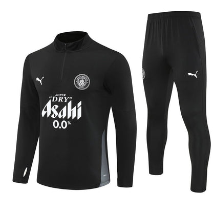 25/26 Manchester City x Asahi Black Kids Size Tracksuit from FootballPrestige.club - Premium Football Kits