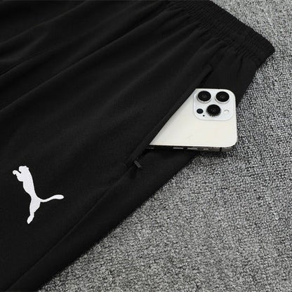 25/26 Manchester City x Asahi Black Tracksuit from FootballPrestige.club - Premium Football Kits