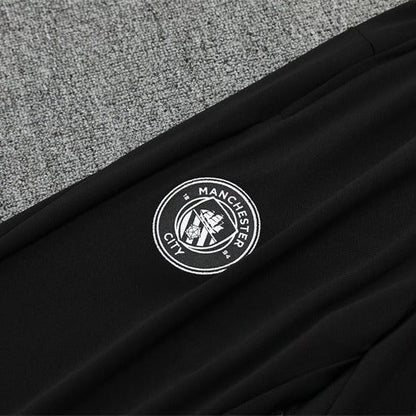 25/26 Manchester City x Asahi Black Tracksuit from FootballPrestige.club - Premium Football Kits