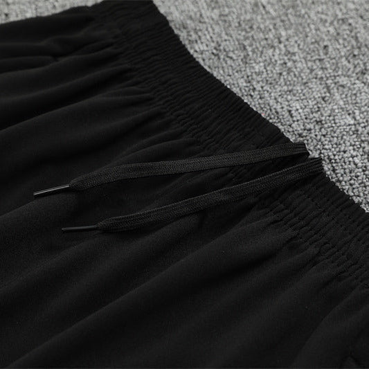 25/26 Manchester City x Asahi Black Tracksuit from FootballPrestige.club - Premium Football Kits