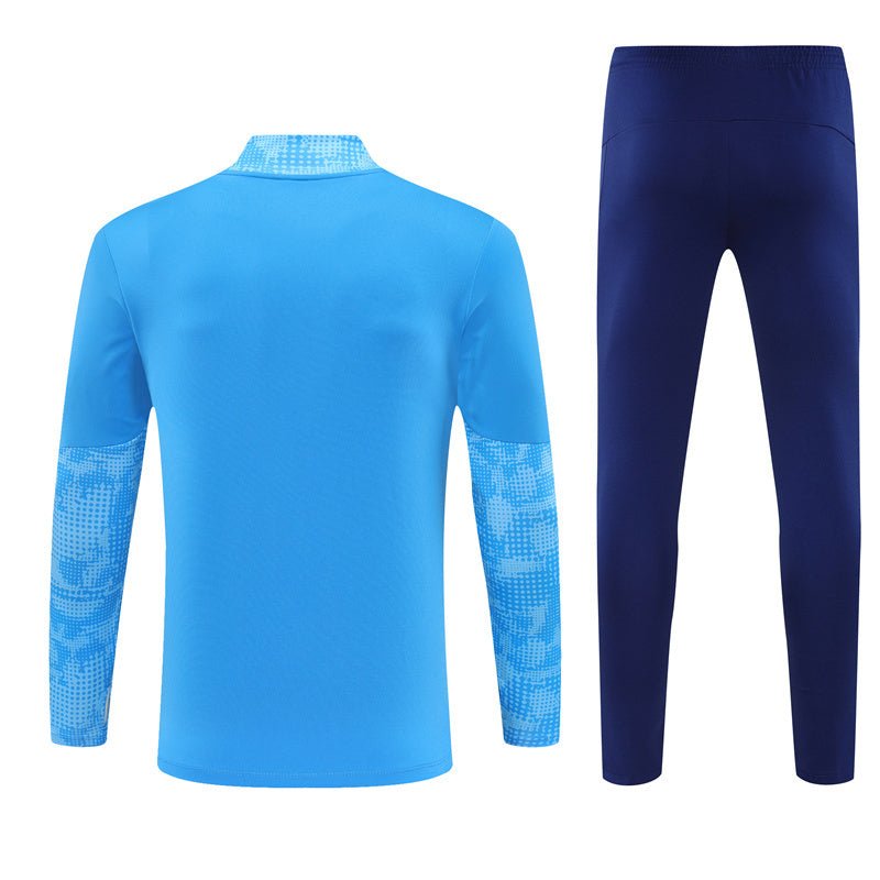 25/26 Manchester City x Asahi Blue Kids Size Tracksuit from FootballPrestige.club - Premium Football Kits