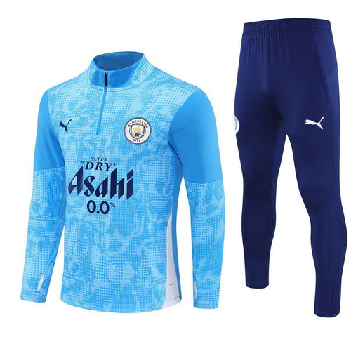 25/26 Manchester City x Asahi Blue Tracksuit from FootballPrestige.club - Premium Football Kits