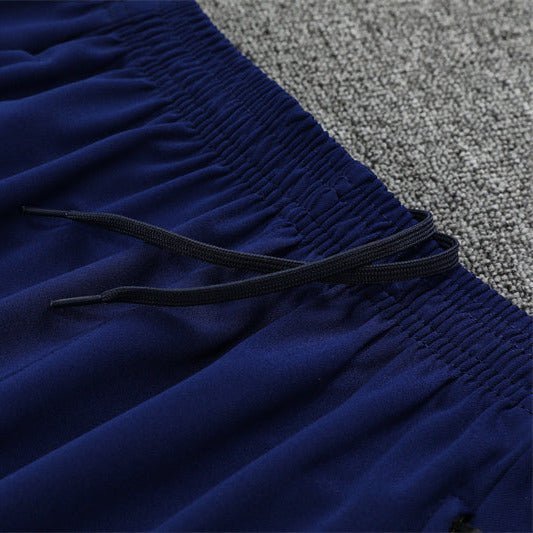 25/26 Manchester City x Asahi Blue Tracksuit from FootballPrestige.club - Premium Football Kits