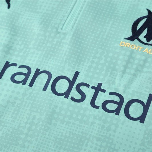 25/26 Marseille Training Mint Green Kids Size Tracksuit from FootballPrestige.club - Premium Football Kits
