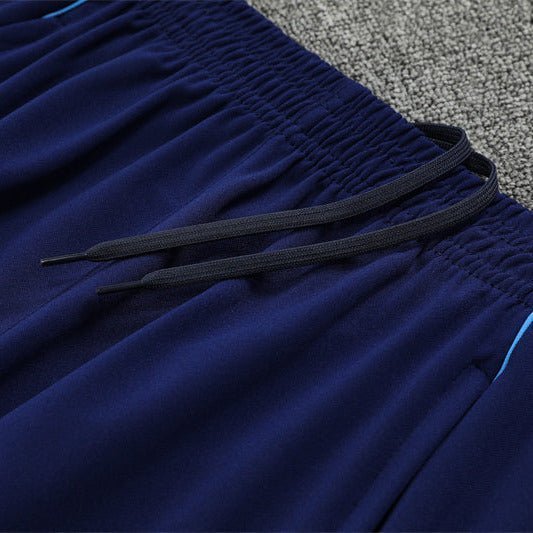 25/26 Real Madrid Training Blue Tracksuit from FootballPrestige.club - Premium Football Kits