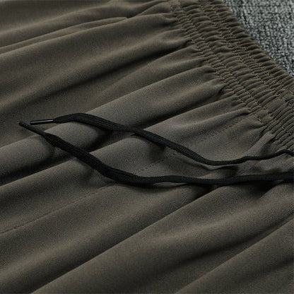 25/26 Real Madrid Training Dark Olive Tracksuit from FootballPrestige.club - Premium Football Kits