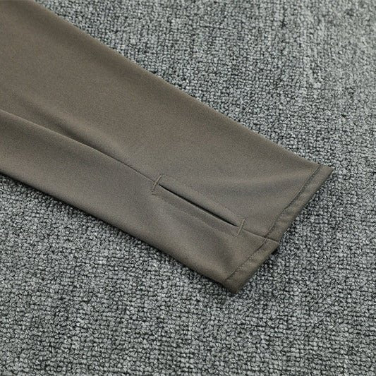 25/26 Real Madrid Training Dark Olive Tracksuit from FootballPrestige.club - Premium Football Kits