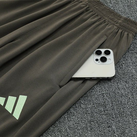 25/26 Real Madrid Training Dark Olive Tracksuit from FootballPrestige.club - Premium Football Kits