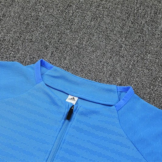 25/26 Real Madrid Training Light Blue Tracksuit from FootballPrestige.club - Premium Football Kits