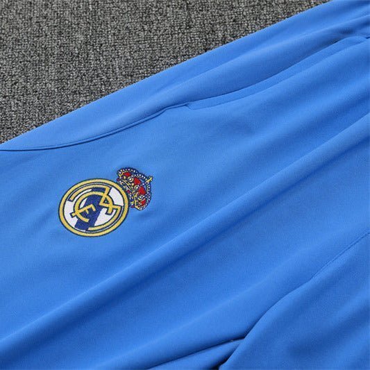 25/26 Real Madrid Training White/Light Blue Tracksuit from FootballPrestige.club - Premium Football Kits