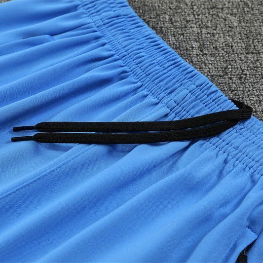 25/26 Real Madrid Training White/Light Blue Tracksuit from FootballPrestige.club - Premium Football Kits