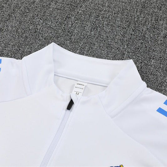 25/26 Real Madrid Training White/Light Blue Tracksuit from FootballPrestige.club - Premium Football Kits