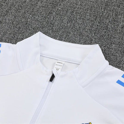 25/26 Real Madrid Training White/Light Blue Tracksuit from FootballPrestige.club - Premium Football Kits