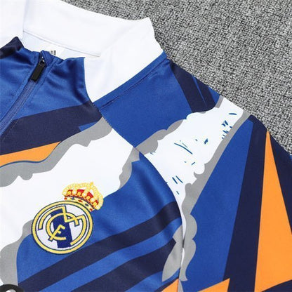 Real Madrid "Azul Reactor" Premium Kids Size Tracksuit from FootballPrestige.club - Premium Football Kits