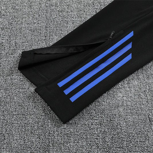 Real Madrid "Azul Reactor" Premium Kids Size Tracksuit from FootballPrestige.club - Premium Football Kits