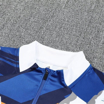 Real Madrid "Azul Reactor" Premium Kids Size Tracksuit from FootballPrestige.club - Premium Football Kits