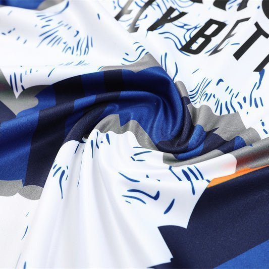 Real Madrid "Azul Reactor" Premium Kids Size Tracksuit from FootballPrestige.club - Premium Football Kits