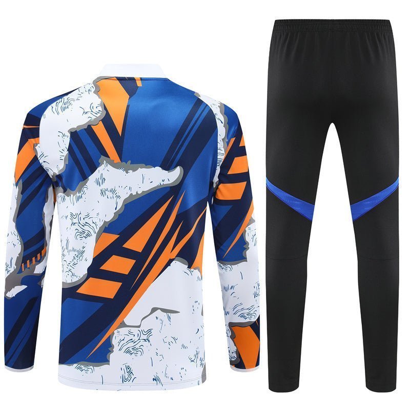 Real Madrid "Azul Reactor" Premium Kids Size Tracksuit from FootballPrestige.club - Premium Football Kits