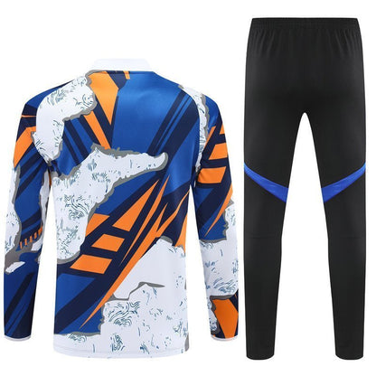 Real Madrid "Azul Reactor" Premium Kids Size Tracksuit from FootballPrestige.club - Premium Football Kits