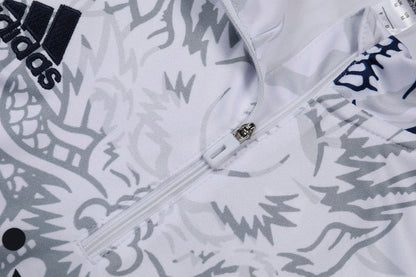 Real Madrid "Dragón Blanco" Premium Tracksuit from FootballPrestige.club - Premium Football Kits
