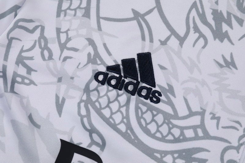 Real Madrid "Dragón Blanco" Premium Tracksuit from FootballPrestige.club - Premium Football Kits