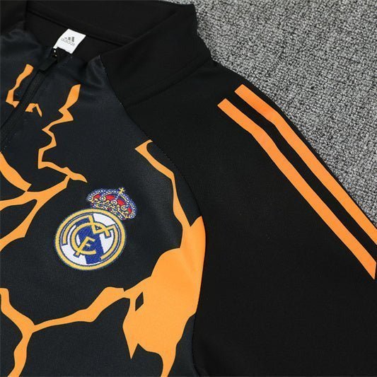 Real Madrid "Eruption" Premium Tracksuit from FootballPrestige.club - Premium Football Kits