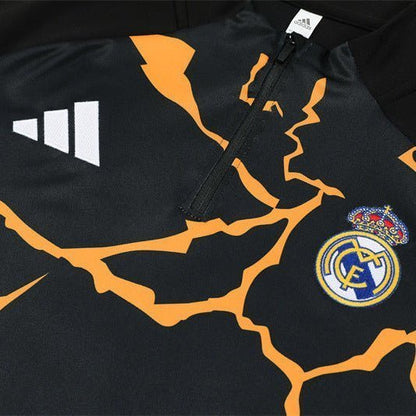Real Madrid "Eruption" Premium Tracksuit from FootballPrestige.club - Premium Football Kits
