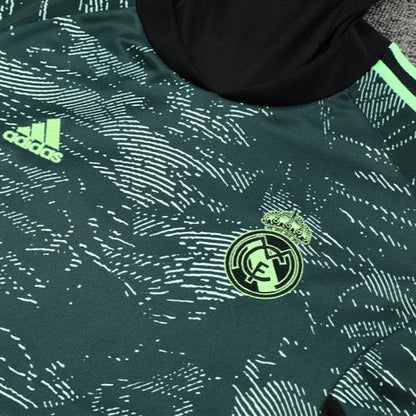 Real Madrid "Forest Silence" Premium UCL Tracksuit from FootballPrestige.club - Premium Football Kits