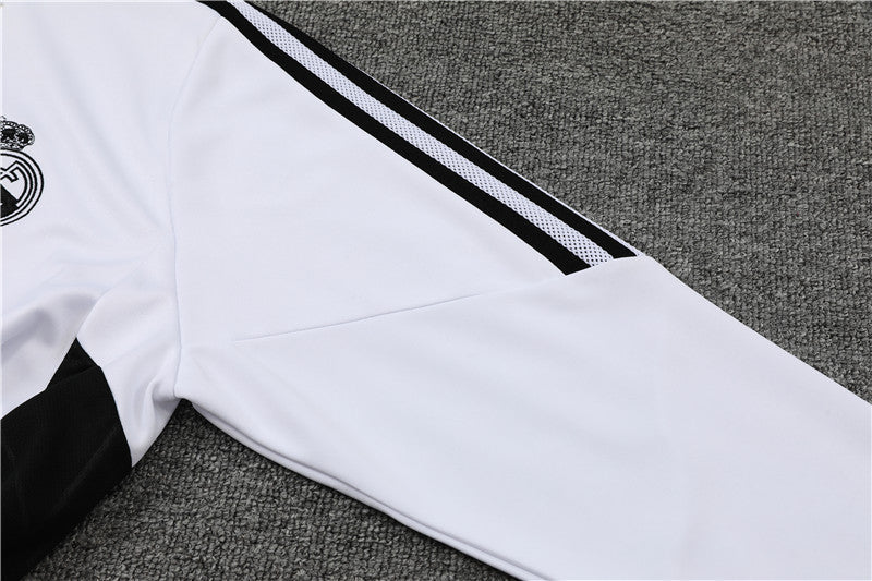 Real Madrid "Momentum" Premium Tracksuit from FootballPrestige.club - Premium Football Kits