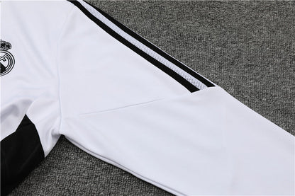 Real Madrid "Momentum" Premium Tracksuit from FootballPrestige.club - Premium Football Kits