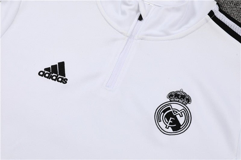 Real Madrid "Momentum" Premium Tracksuit from FootballPrestige.club - Premium Football Kits