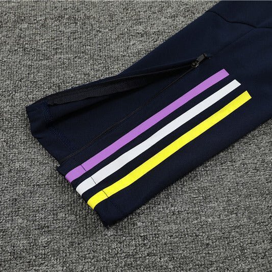 Real Madrid "Virtuoso" Premium Kids Size Tracksuit from FootballPrestige.club - Premium Football Kits