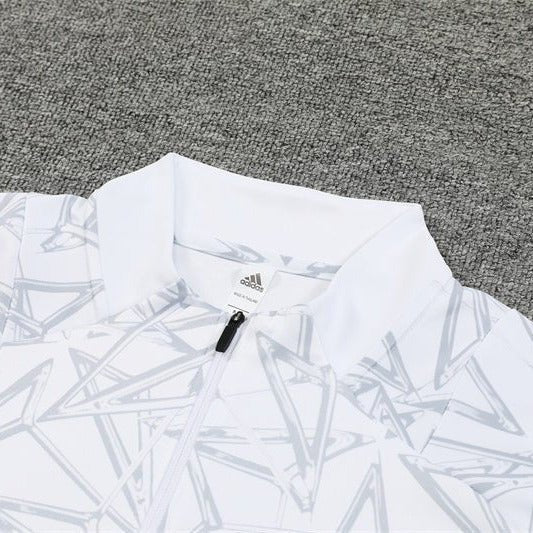Real Madrid "White Armor" Premium Kids Size Tracksuit from FootballPrestige.club - Premium Football Kits